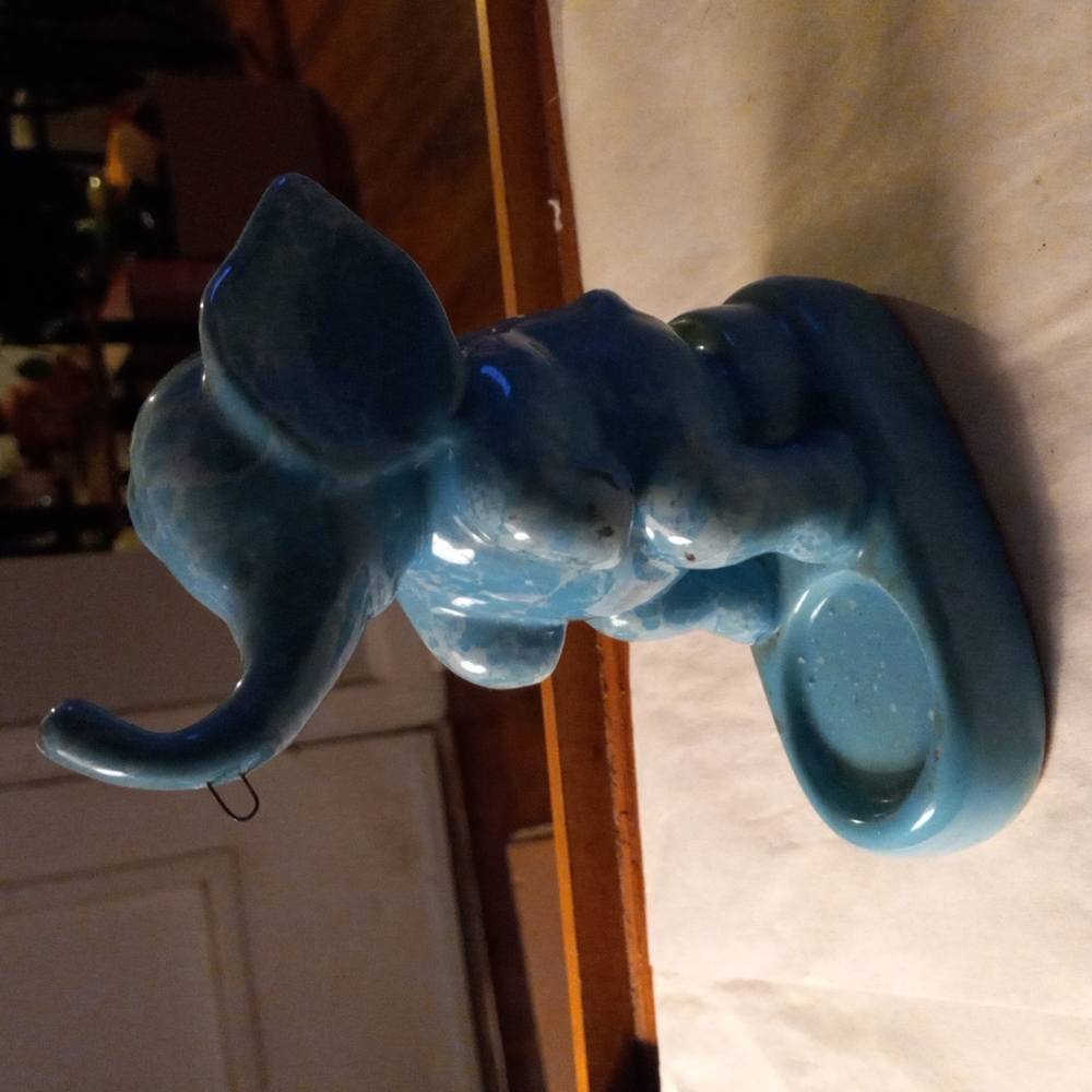 Candle stick blue elephant.
